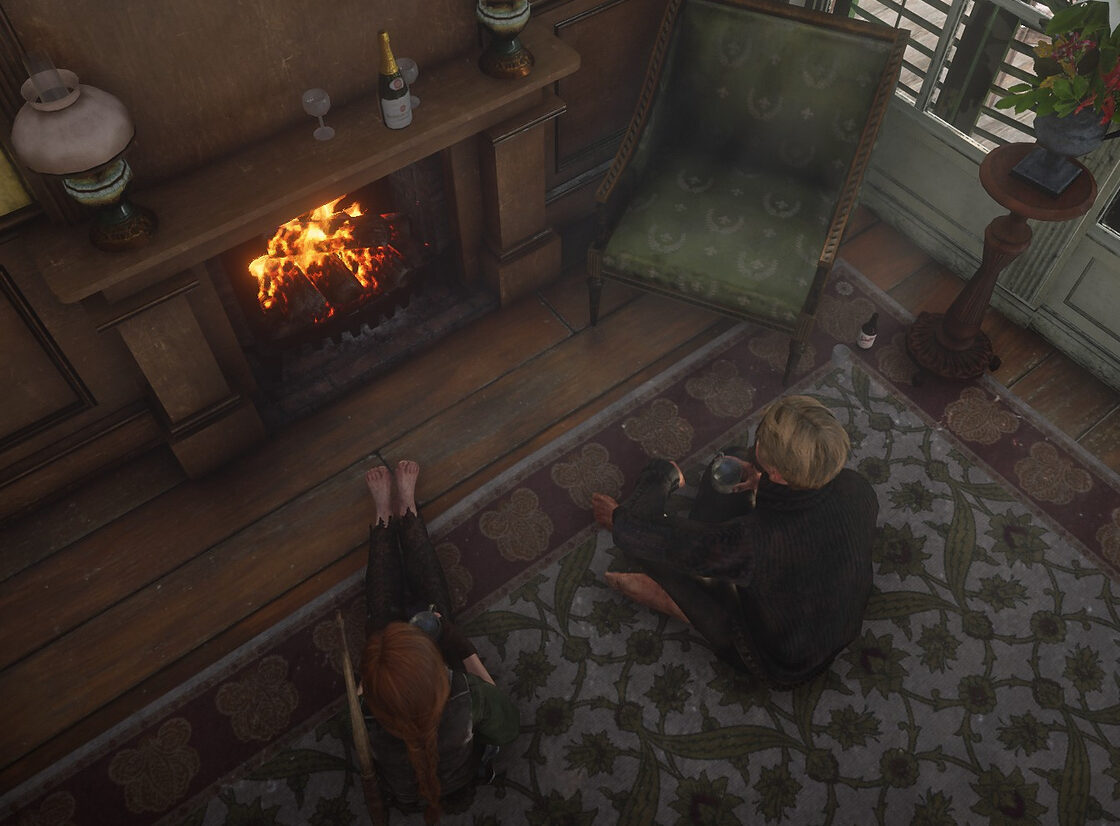 Two video game avatars sitting on the floor beside a lit fireplace. A redheaded female character with a bow on her back is warming her bare feet. The male character beside her is wearing a black ribbed sweater and has blonde hair.